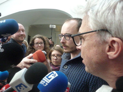 Close-up of Antoine answering to journalists, with Mr. Bourdon