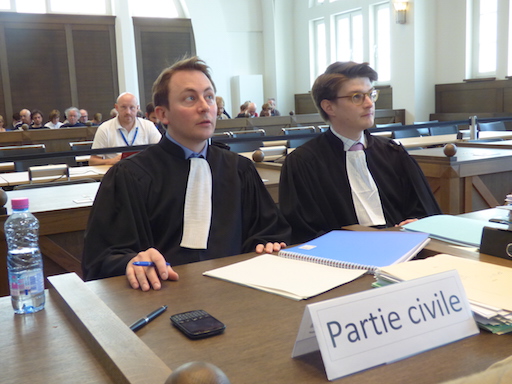 The plaintiff’s lawyers, sitting in the courtroom (photo taken during the first trial)