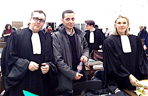 Édouard Perrin and his lawyers, in the courtroom